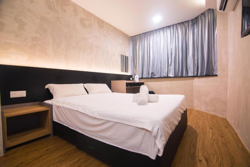 Monaco Boutique Hotel Sadong Jaya Kota Kinabalu Kültér fotó