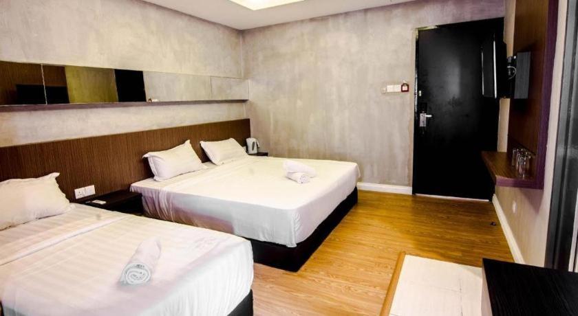 Monaco Boutique Hotel Sadong Jaya Kota Kinabalu Kültér fotó