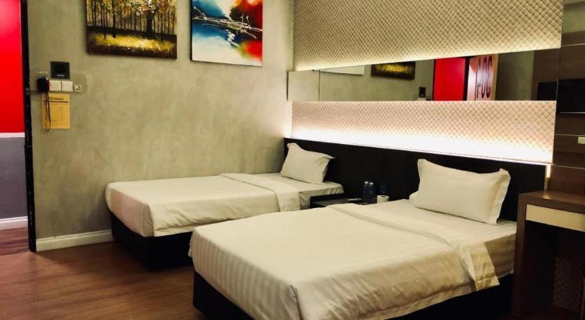 Monaco Boutique Hotel Sadong Jaya Kota Kinabalu Kültér fotó